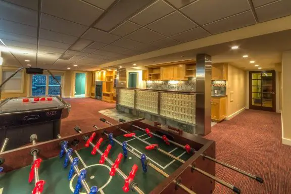 transform your finished basement into a game room by creative design interiors