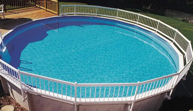 home backyard round pool with railing