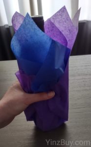 how to put tissue paper in a wine gift bag step 4 completely fold the tissue paper around your bottle copyright yinzbuy