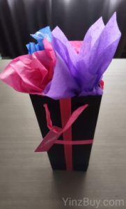 how to put tissue paper in a wine gift bag step 6 add additional sheets of paper copyright yinzbuy