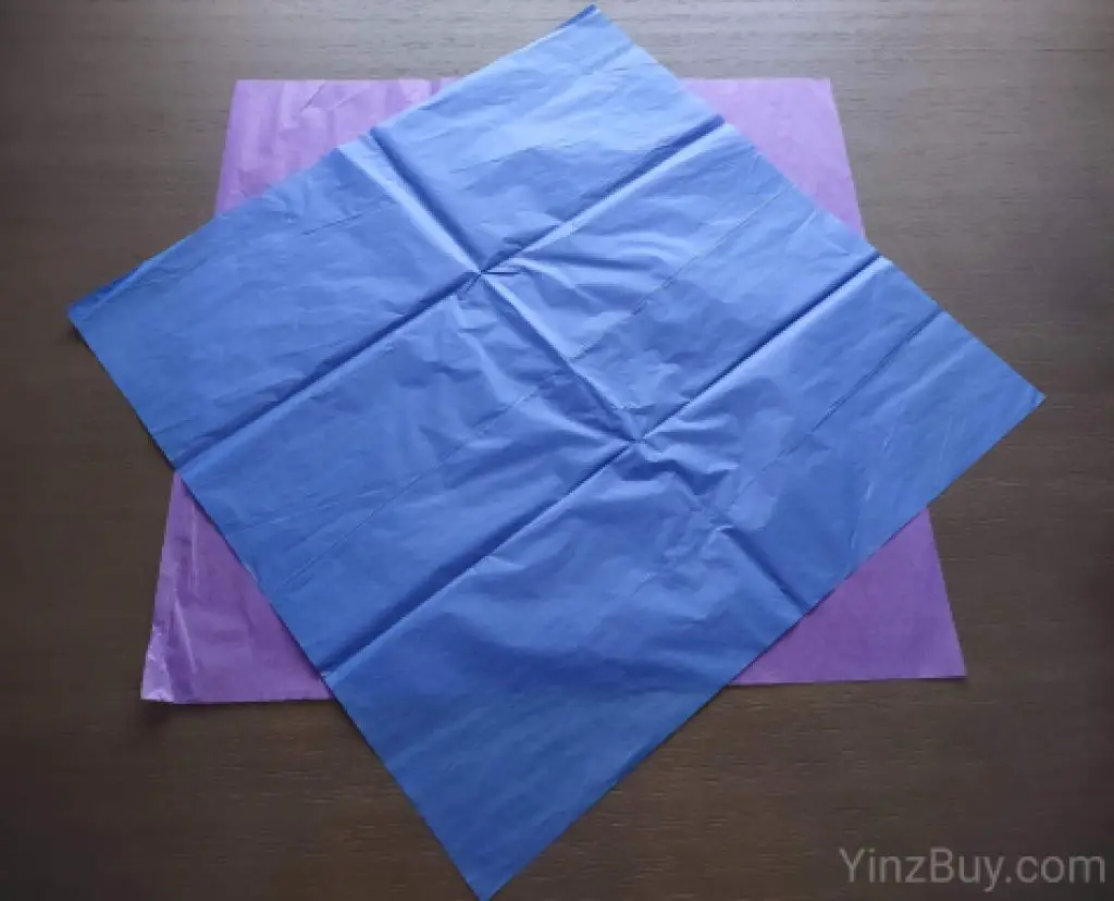 rotate one piece of tissue paper 45 degrees and place it on top of the other copyright yinzbuy