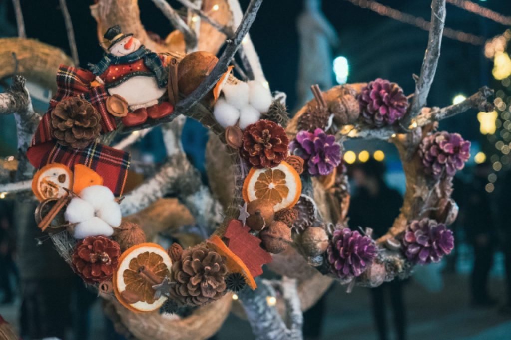 homemade branch winter wreath with snowman