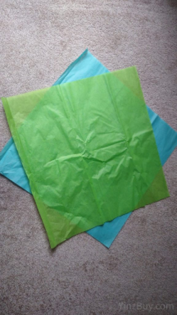 how to wrap a large planted pot step 3 rotate the bottom tissue copyright yinzbuy