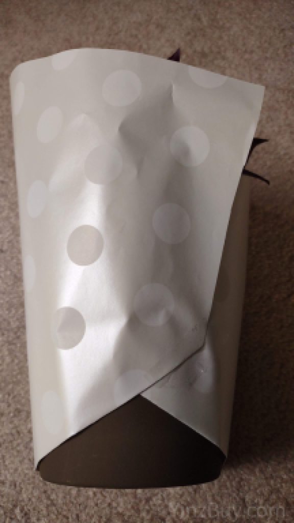 how to wrap a short plant step 5 fold paper up along the sides copyright yinzbuy